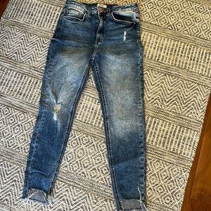 Forever 21 Jeans. Size 28. Ripped hem detail.